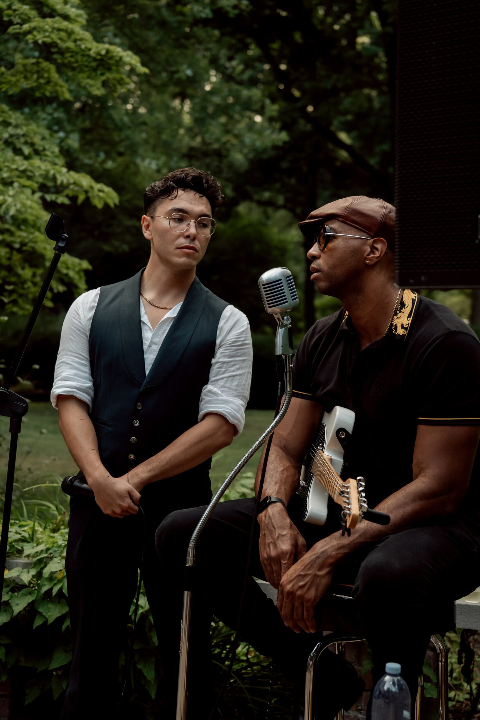 Guests in conversation under warm lighting